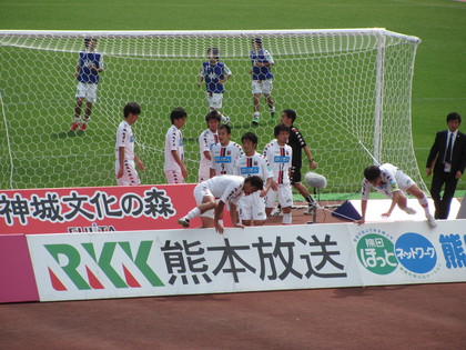 看板を飛び越えて